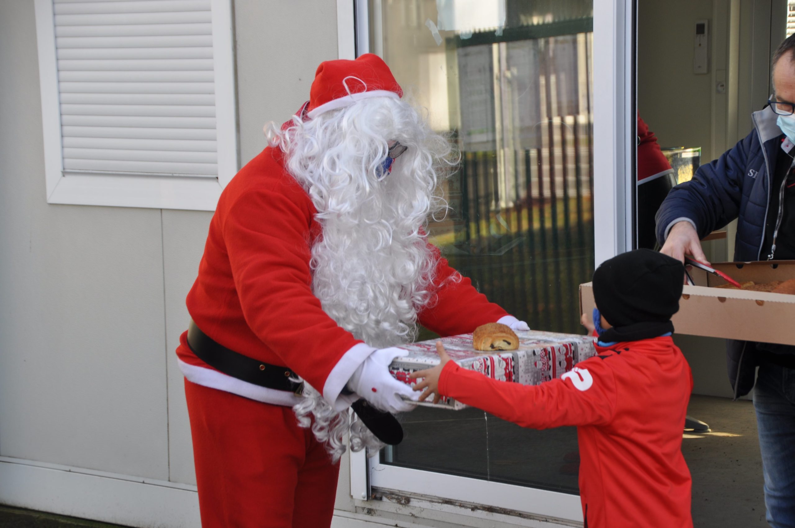 Le Père Noël et Torix auprès des jeunes U6-U8